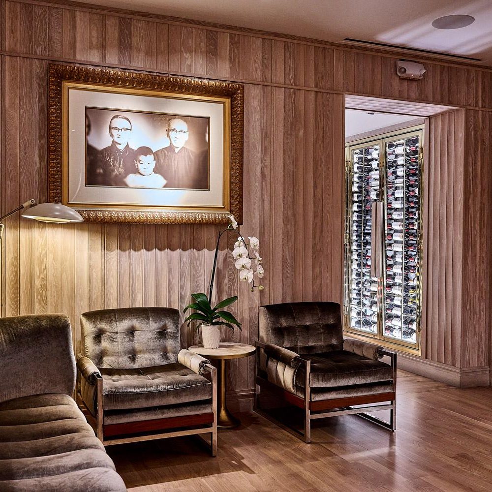 A seating area with luxurious velvet furniture